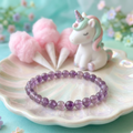 Amethyst bracelet in a cotton candy garden with a unicorn