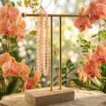 Matte Rose Quartz bracelets with peach and coral orchids