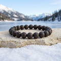 Lava Rock bracelet with a frozen lake and snowy mountains