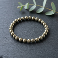 Pyrite bracelet with the matching slate and eucalyptus background