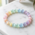 Rainbow selenite bracelet on white marble